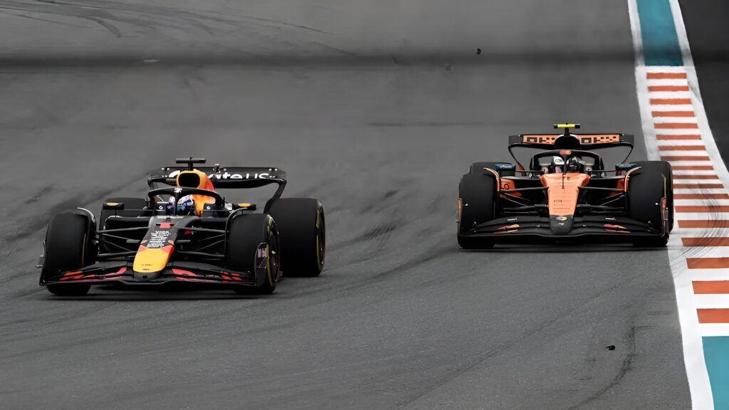 F1 2025 Miami GP Race Lando Norris in Mclaren chasing Max Verstappen in Red bull Racing