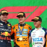 Max Verstappen, Oscar Piastri, and Isack Hadjar on the podium at F1 2025 Dutch Grand Prix