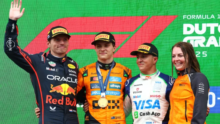 Max Verstappen, Oscar Piastri, and Isack Hadjar on the podium at F1 2025 Dutch Grand Prix